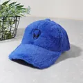 Detail of navy blue fuzzy baseball cap with alien embroidery on soft plush fabric - Sapphire Blue