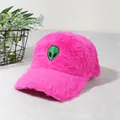 Detail of plush rose pink baseball cap with a green alien embroidery and soft texture - Deep Pink