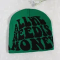 Neon green knit beanie featuring black All We Need Is Money text for winter - Green