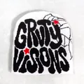 Close-up of white knit beanie featuring black gothic embroidery and red stars detail - One Size / White