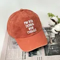 Vintage washed brick red baseball cap featuring white I'M BOB embroidery detail - One Size / Orange