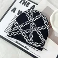 Trendy black and white knitted beanie with chain jacquard pattern for winter sports - One Size / Black