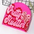 Hot pink knit beanie with red letter pattern and butterfly detail for winter - One Size / Deep Pink