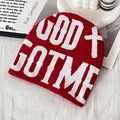 Red knit beanie with white GOD GOT ME lettering and cross embroidery in street style - One Size / Red