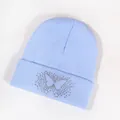 Light blue knit beanie featuring a colorful rhinestone butterfly pattern on the cuff - Light Blue