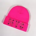 Neon pink ribbed knit beanie featuring sparkling rhinestone NYC letter embellishment - Deep Pink