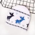 White Christmas knitted beanie featuring blue reindeer jacquard patterns and soft texture - White Blue Reindeer