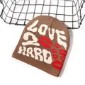 Brown knitted beanie with Love 2 Hard text and red lip patterns for winter street style - One Size / Brown