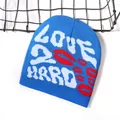 Royal blue beanie featuring white LOVE HARD text and red lip patterns in knit jacquard - One Size / Sapphire Blue