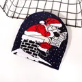 Navy blue knitted Christmas hat featuring a Santa Claus pattern on a snowy dot background - Navy Santa Chimney