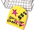 Yellow jacquard knit beanie featuring black stars and dollar symbols for street style - One Size / Yellow