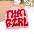 Pink knitted beanie featuring red THAT GIRL jacquard text for winter streetwear style - One Size / Light Pink