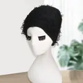 Fuzzy black camo knitted beanie with fringe texture for winter warmth and style - One Size / Black