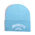 Light blue knit beanie featuring white Brooklyn 1898 embroidery and cuffed design - One Size / Light Blue