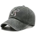 Washed dark gray denim baseball cap featuring pink bow embroidery and soft top design - One Size / Dark Green