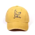 Washed cotton baseball cap in ginger yellow featuring a pug print and curved brim - Yellow