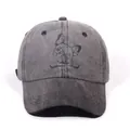 Adjustable gray washed denim baseball cap featuring a black bulldog graphic print - Black