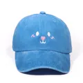 Washed blue denim baseball cap featuring cute cartoon animal face embroidery - Blue