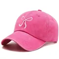 Pink washed denim baseball cap featuring white embroidered bow for a cute style - One Size / Rose Red