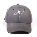 Dark grey washed cotton baseball cap featuring a white dragonfly embroidery for casual wear - Black
