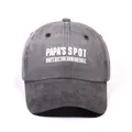 Unisex dark grey washed baseball cap featuring white PAPA'S SPOT text embroidery - One Size / Black