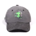 Washed dark gray baseball cap with a green alien print and distressed street style look - Black