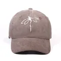 Washed cotton baseball cap in vintage brown with white dragonfly embroidery detail - Coffee