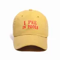 Classic mustard yellow cotton baseball cap with red 'I PEE IN POOLS' embroidery - Yellow