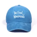 Blue THE FISH WHISPERER baseball cap with a unique fish hook design on the front - Blue