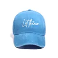 Washed blue denim baseball cap featuring white Let Them embroidery for men and women - One Size / Blue