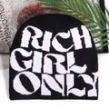 Black knit beanie with white RICH GIRL ONLY lettering for street fashion and warmth - Black and White