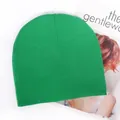 Grass green knit beanie for men and women featuring a minimalist plain stitch design - Verdant