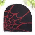 Y2K knit beanie featuring a bold red spider web pattern on black fabric - One Size / Dark Red