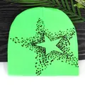 Fluorescent green knit beanie featuring a black pixelated star pattern for street style - One Size / Fluorescent Green