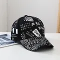 Black cotton baseball cap with white street style graffiti print and adjustable strap - I Love You-Black