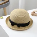 Straw sun hat for kids in beige with a black bow ribbon and stylish woven texture - S (52-54cm) / Beige