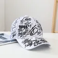 White baseball cap with black graffiti print featuring trendy urban street style design - 1997SUPER Graffiti-White