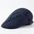 Marineblaue gesteppte Baskenmütze mit weißer Stickerei und verstellbarer Metallschnalle - Verstellbar / Marineblau