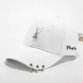 White cotton baseball cap with Paris embroidery and three metal rings on the brim - Children (2-8 Years Old)