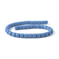 Primer plano de cuentas cilíndricas de piedra de lava azul para joyería DIY - 6x6mm / Azul