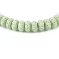 Dettaglio di perle in pietra lavica verde chiaro con trama a nido d'ape per gioielli DIY - Verde Menta (N. 7)