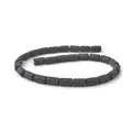 Macro detail of natural black lava rock cylinder beads with porous texture for DIY jewelry - Dark Gray (No.6)