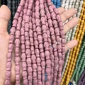 Perles tête de mort en pierre de lave rose pour bijoux DIY avec texture volcanique - Forme de Crâne/Petit Animal / N°4 (Rose) / 9X14mm