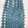 Perles en forme de croix en pierre volcanique bleue pour bijoux DIY avec texture poreuse - Bleu