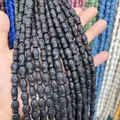 Perline in pietra lavica nera a forma di pesce con texture porosa per gioielli fai-da-te - Colore 11 (Nero)