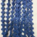 Perles en forme de croix en roche volcanique bleue pour bijoux DIY avec texture poreuse - Bleu clair