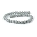 Vista dettagliata di perle di pietra lavica grigia porosa da 8mm per gioielli fai da te e aromi - 4mm / Grigio