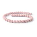 Perle rotonde in pietra lavica rosa con consistenza porosa per bracciali DIY - 4mm / Rosa Chiaro