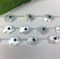 Iridescent mother of pearl elephant beads with blue evil eye motif for DIY jewelry - Elephant Design / Large