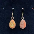 Waterdrop natural stone earrings with orange imperial jasper and gold hooks on black background - Orange